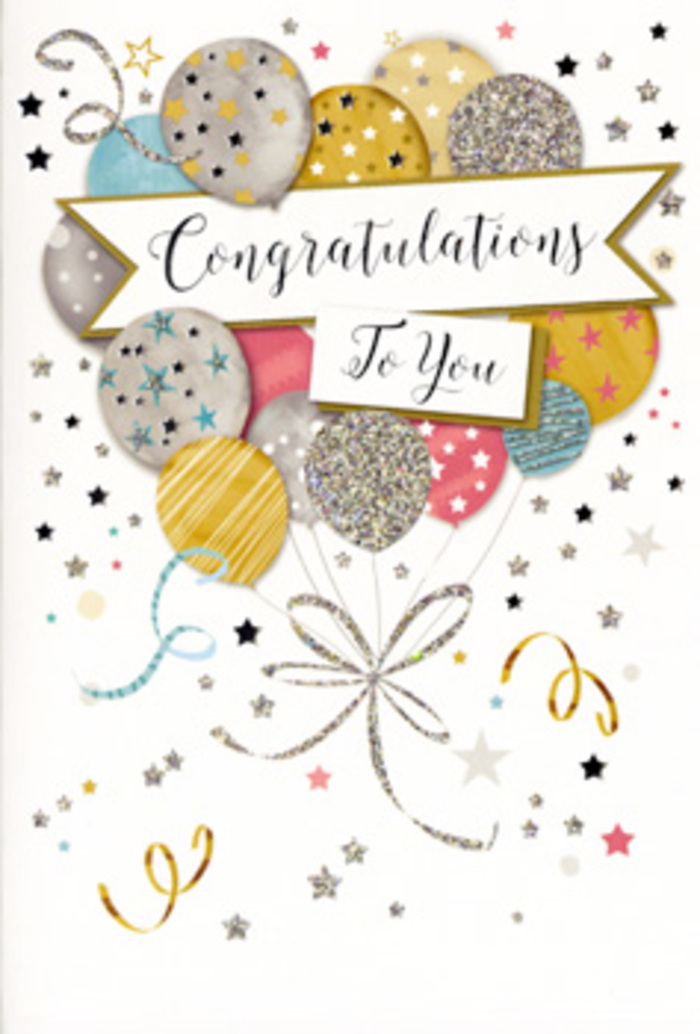 In this photograph, a single congratulations card stands upright, its front artwork evoking the feeling of balloons rising slowly over Brockley rooftops after a celebration. At the heart of the design is an abundant cluster of illustrated balloons, gathered tightly yet floating as one. Their colours move gracefully from luminous gold and silver to soft champagne, sky blue, blush pink, and gentle grey, creating a soothing yet festive palette. Each balloon carries its own decorative pattern: some are adorned with shimmering, glitter-like stripes, others with tiny metallic stars and speckles that give an impression of texture and depth. Fine ribbons, drawn in gleaming gold and silver, descend from the base of the cluster in flowing, interlacing curves, like the loose ribbon strands that trail from a bouquet arranged at Brockley Flowers. The background of the card is a soft, neutral shade, dusted with small stars, curls, and confetti dots that seem to drift weightlessly around the balloons, adding a sense of joyous movement without overwhelming the main motif. Across the middle of the composition, a gentle banner stretches outward, bearing the message Congratulations To You in graceful, looping calligraphy. The lettering feels at once celebratory and composed, giving the impression of carefully chosen words offered with admiration and pride. The card's overall impression is one of polished celebration: not overly bold, but quietly radiant, like the steady happiness after receiving good news. With its mix of metallic accents and pastel tones, it suits a wide variety of special moments in Brockley-from exam results to promotions or new homes-especially when paired with fresh flowers that echo its soft, uplifting energy.